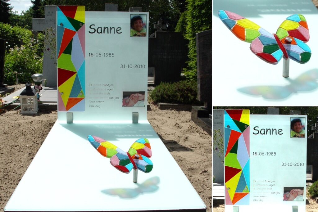 glazen grafsteen met kleuren regenboog